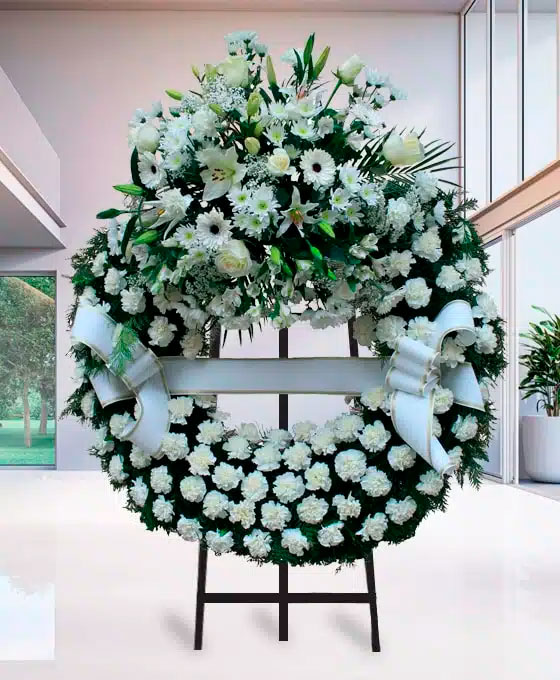 Corona Funeraria de claveles blancos para Funeraria Ramón Vivó